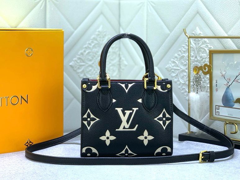 Louis Vuitton OnTheGo PM tote bag in black and beige Bicolor Monogram Empreinte leather. image 1