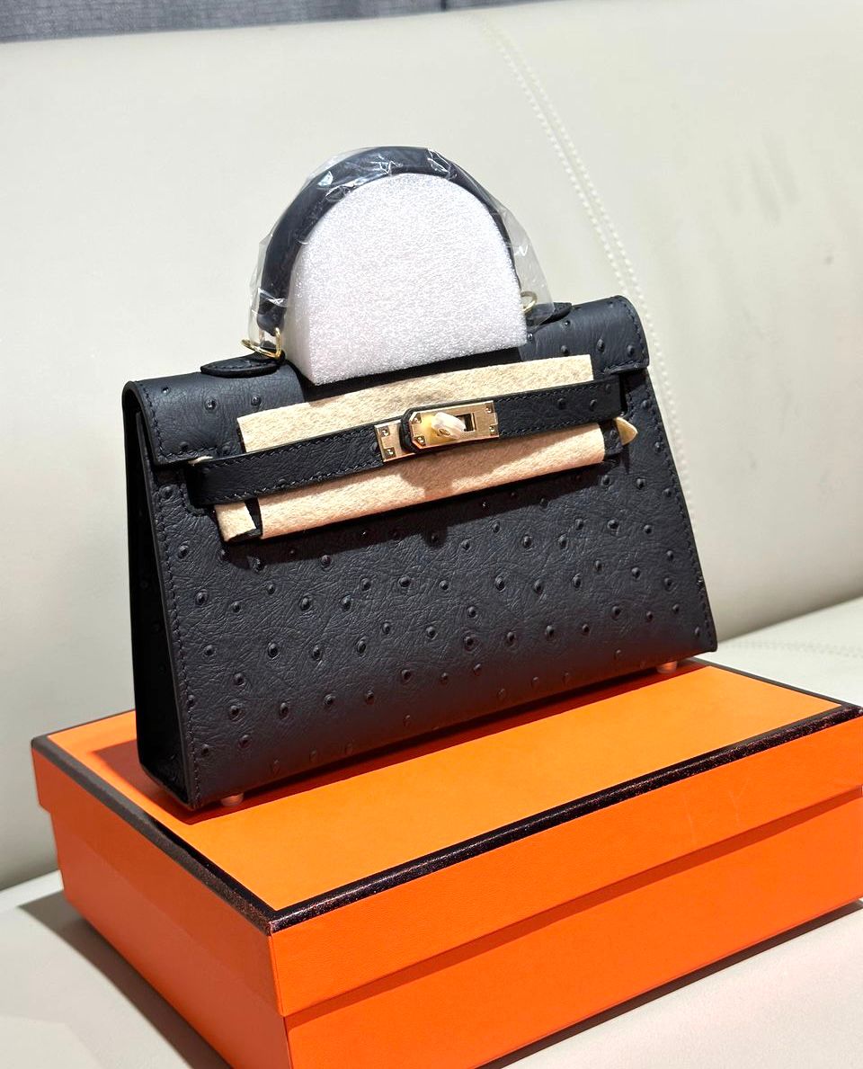 Herm?s Mini Kelly bag in black ostrich leather with gold hardware. image 1