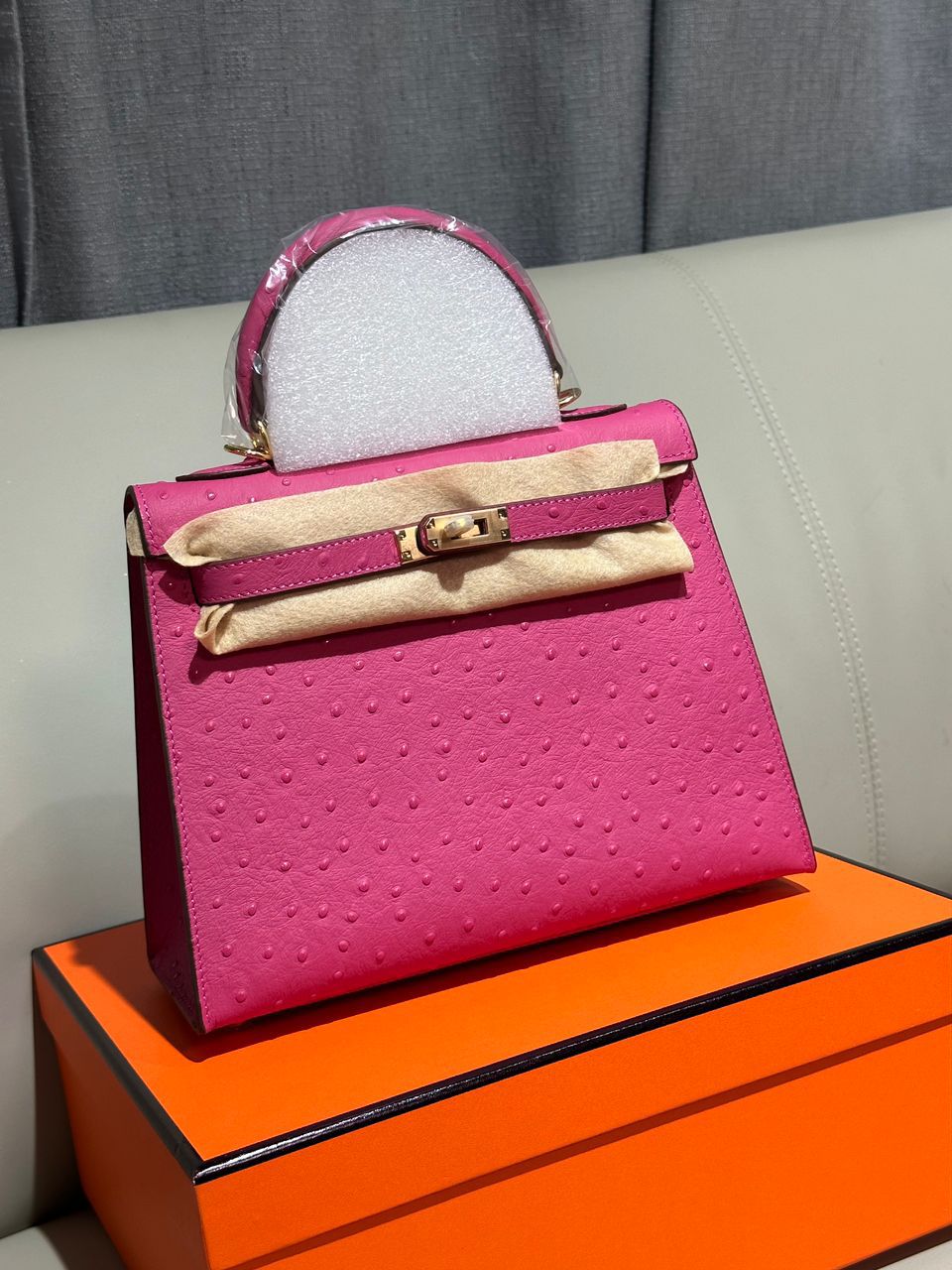 Herm?s Kelly mini or 25cm bag in pink (potentially Rose Bubblegum or Rose Fuchsia) ostrich leather with gold or palladium hardware. image 1