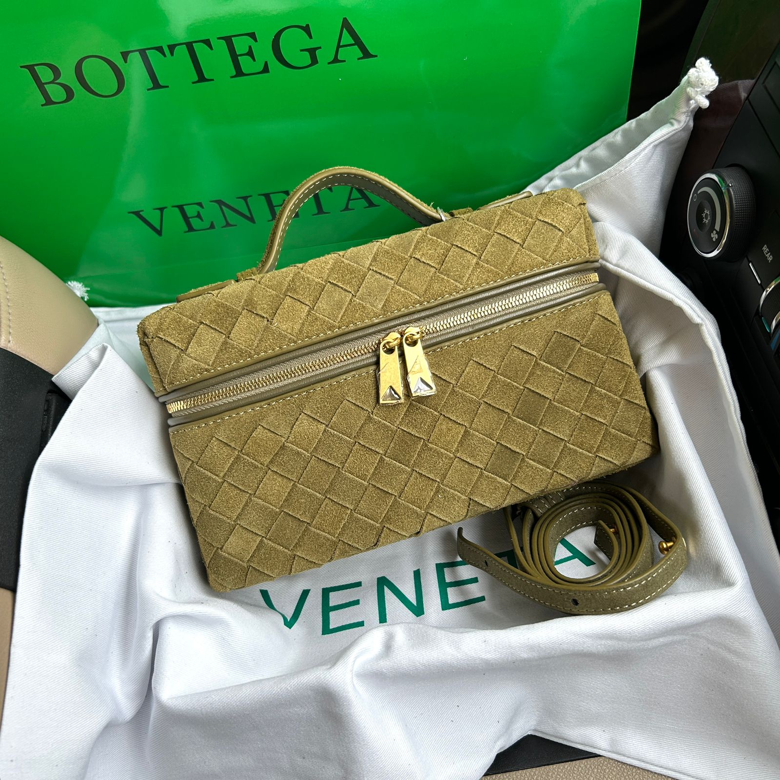 Bottega Veneta Bang Bang Vanity mini intrecciato suede tote in a sand or grey color. image 1