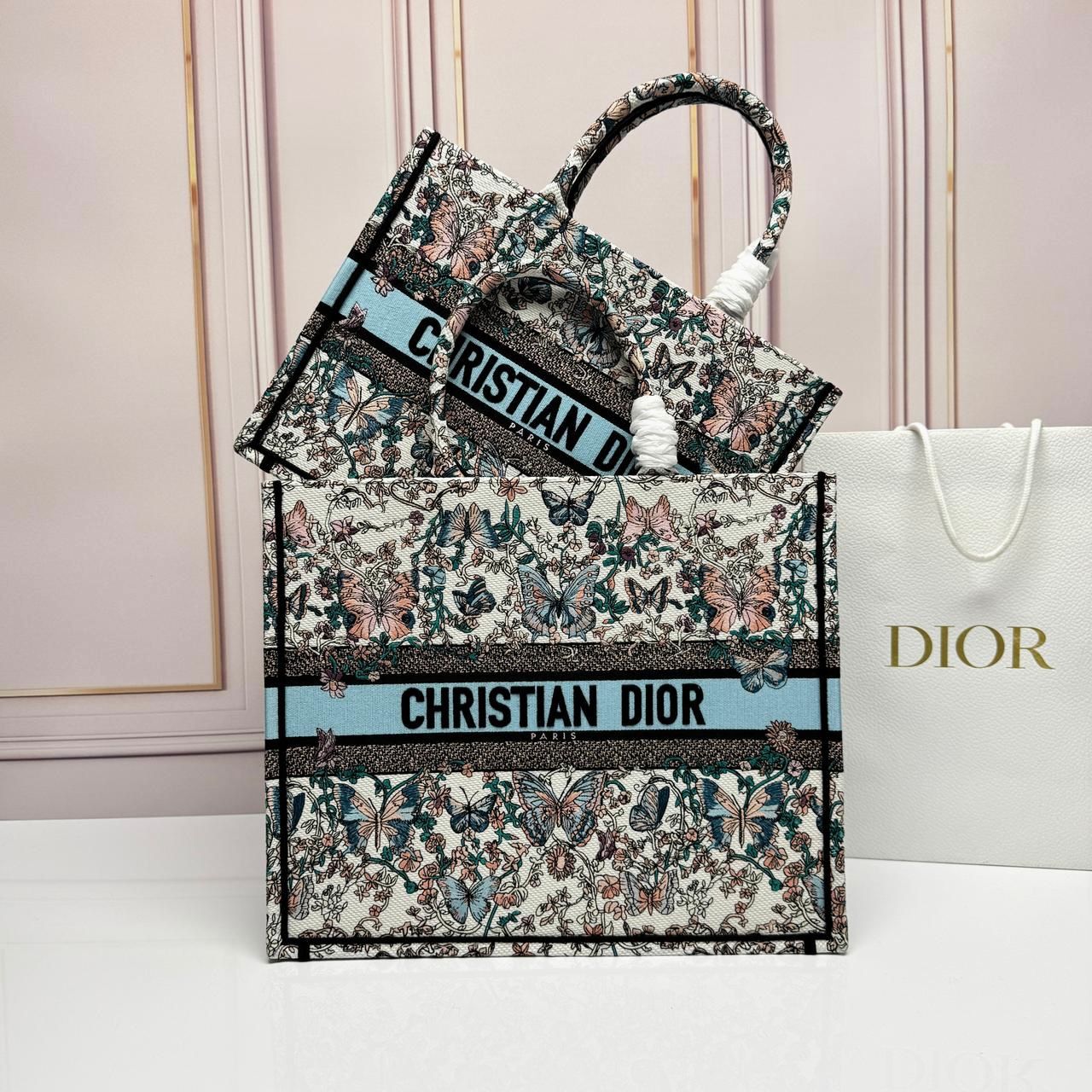 Christian Dior Book Tote in the multicolor Dior Saisons Printemps-?t? motif with a butterfly and floral pattern. image 1