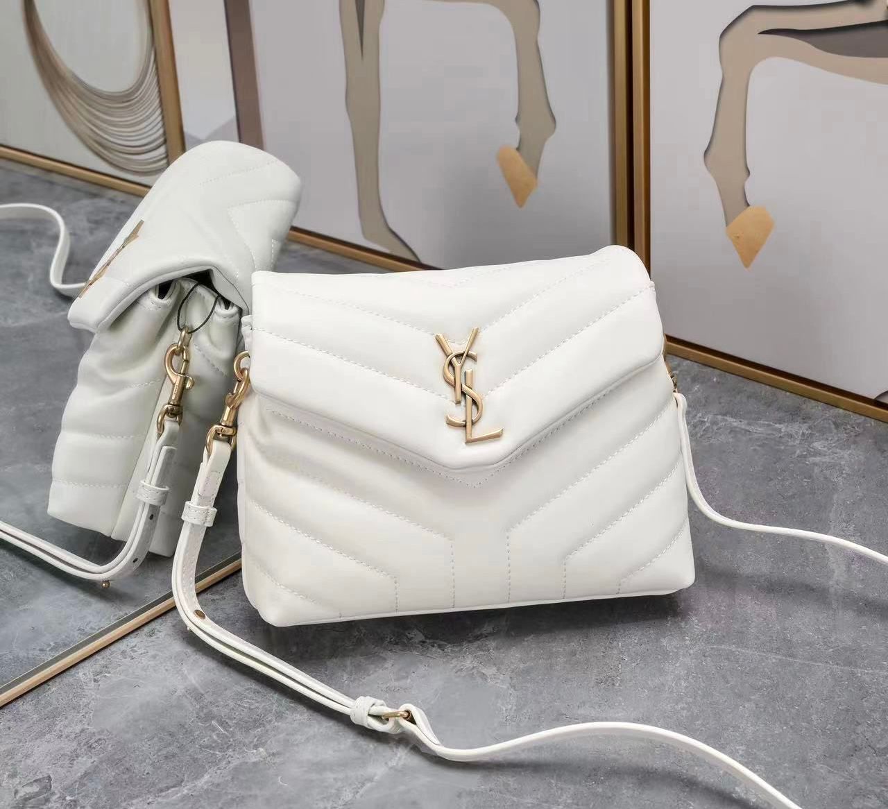 Saint Laurent Loulou Toy leather crossbody bag in white or "blanc vintage" with gold-toned hardware. image 1