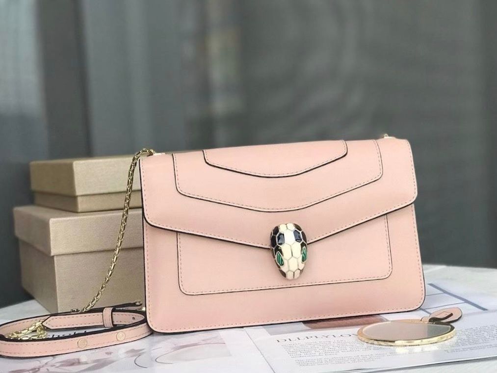 Bvlgari Serpenti Forever small East-West shoulder bag in light pink smooth calf leather with a gold clasp. image 1