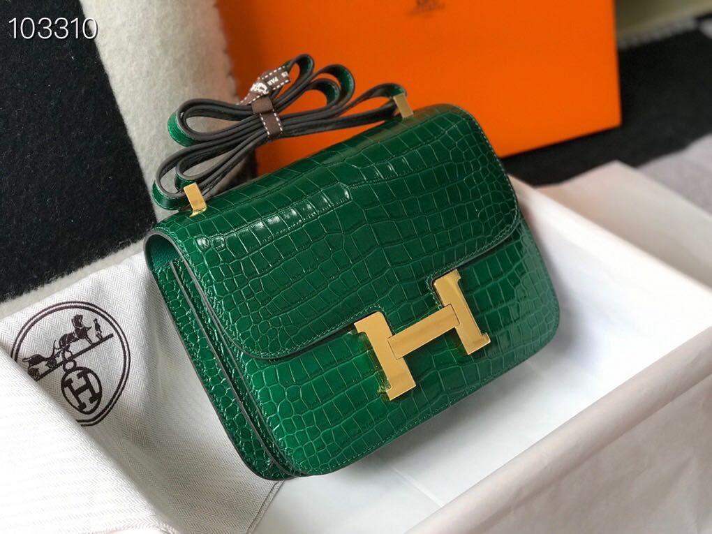 Herm?s Constance bag in green alligator or crocodile leather with gold hardware. image 1
