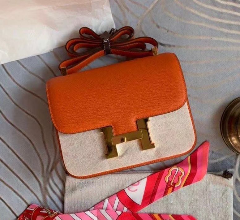 Herm?s Constance 18 bag in Feu orange and white Epsom leather with gold hardware. image 1