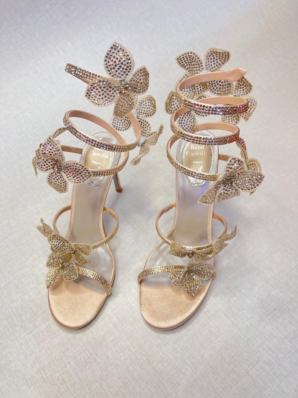 René Caovilla Floriane sandals, featuring crystal-embellished flower appliqués and the brand's signature coiled ankle strap image 1
