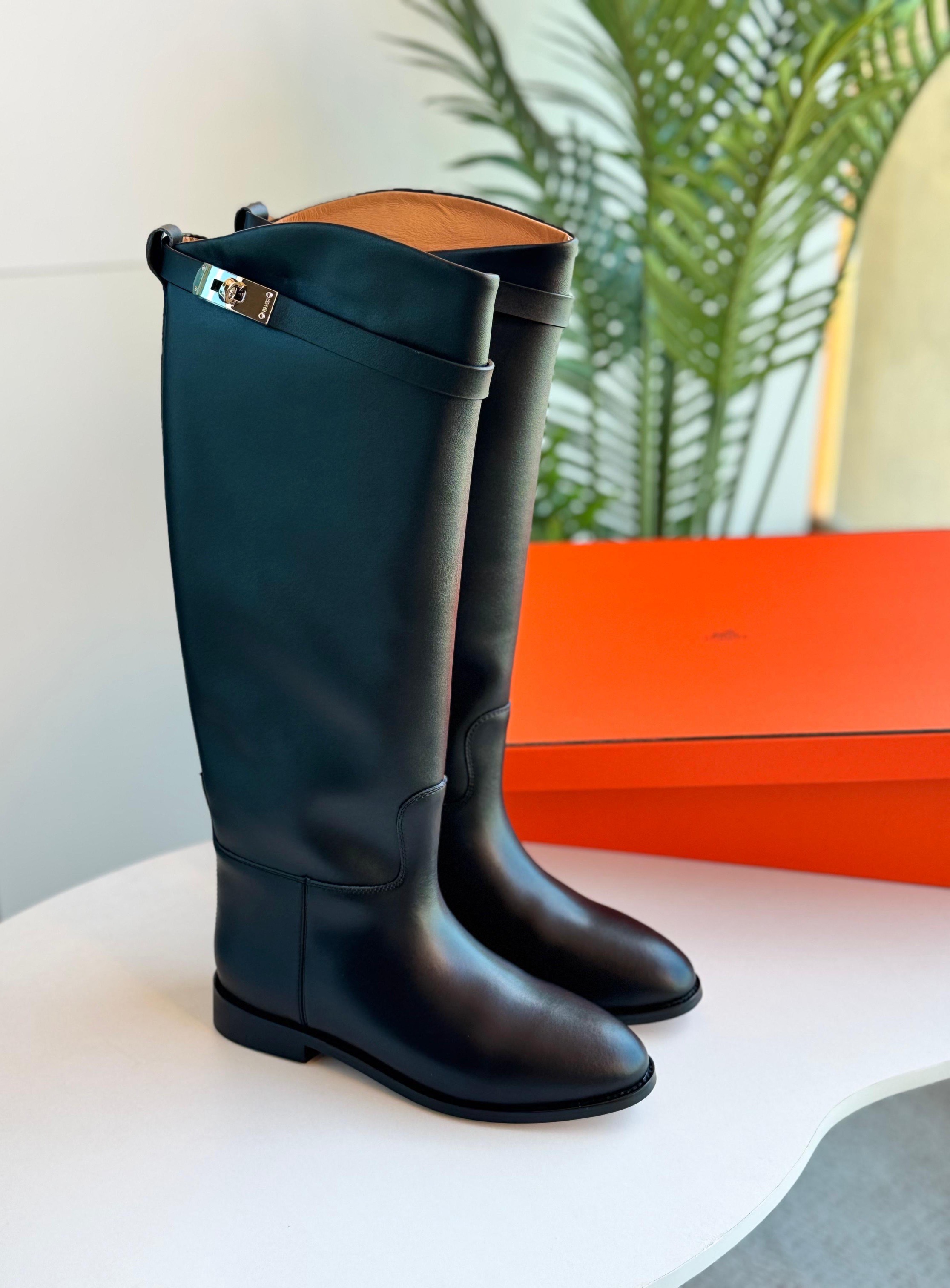 Hermès Jumping boots in black box calfskin with a palladium-plated Kelly buckle. image 1