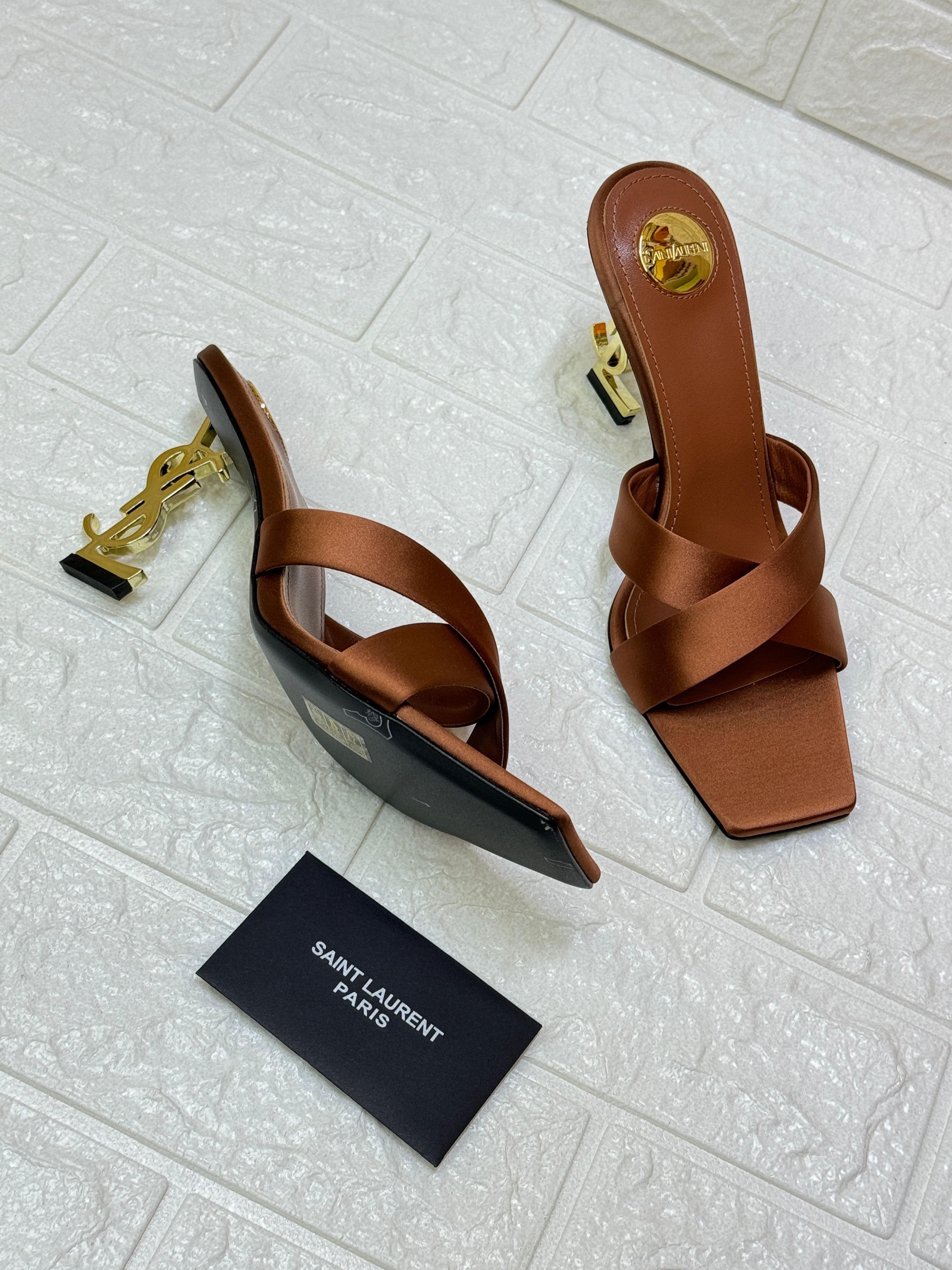 Saint Laurent Opyum 85 mule sandals in brown satin crepe with the iconic gold-tone YSL monogram heel. image 2