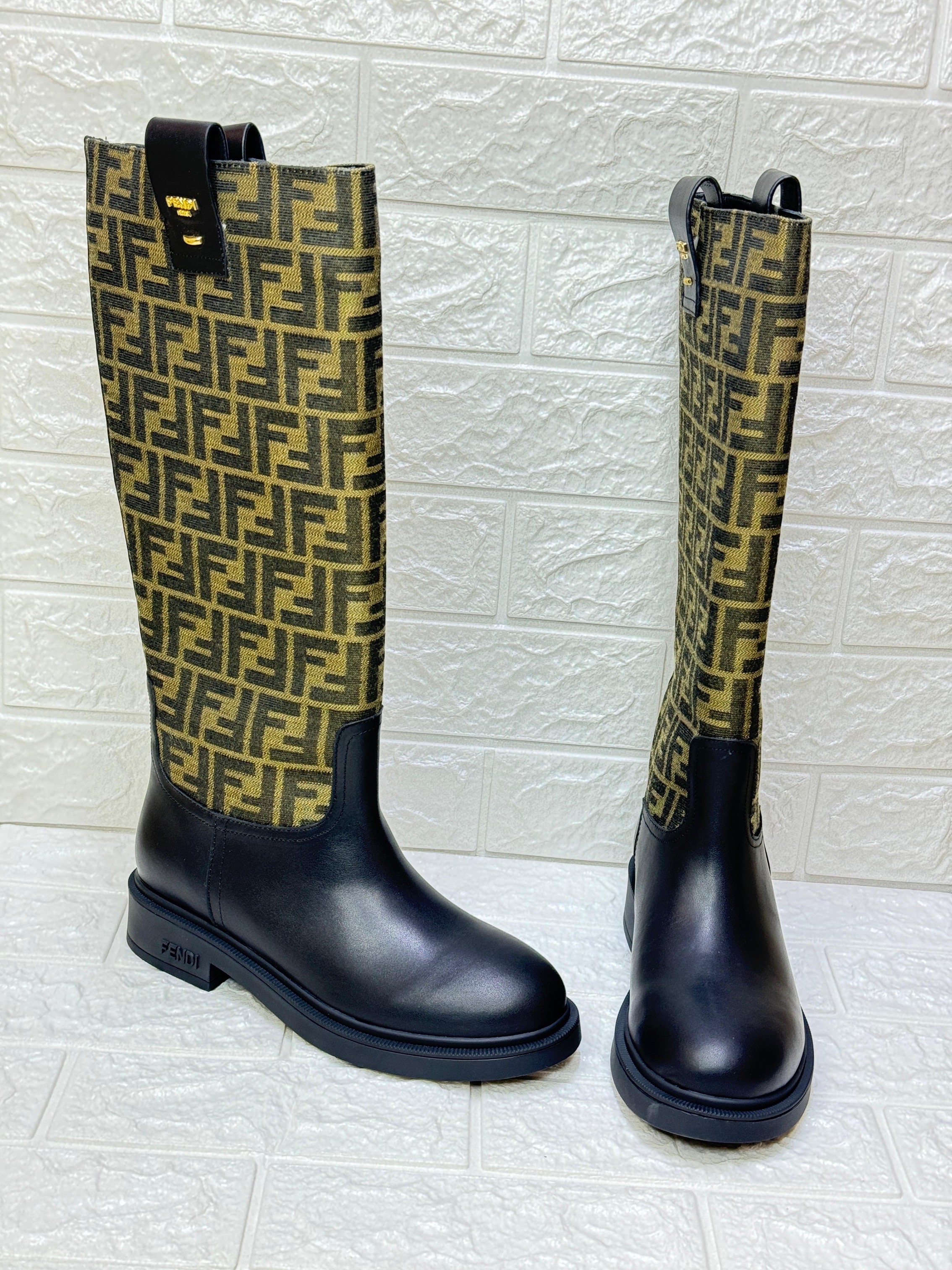 Fendi Filo boots in black leather and brown FF jacquard fabric. image 1