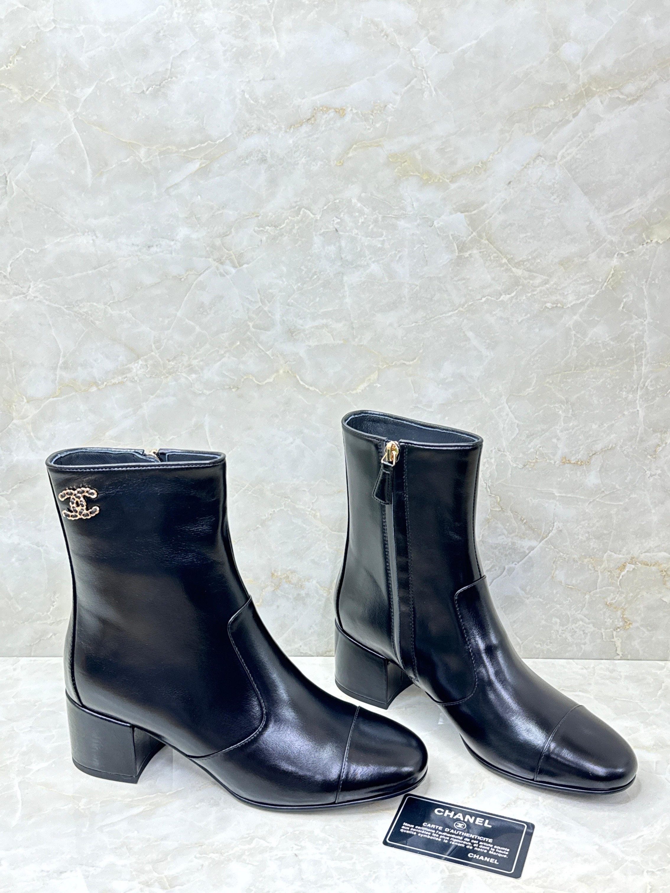 Chanel Stretch Lambskin Cap Toe CC Uniform Short Boots in black stretch lambskin leather. image 1