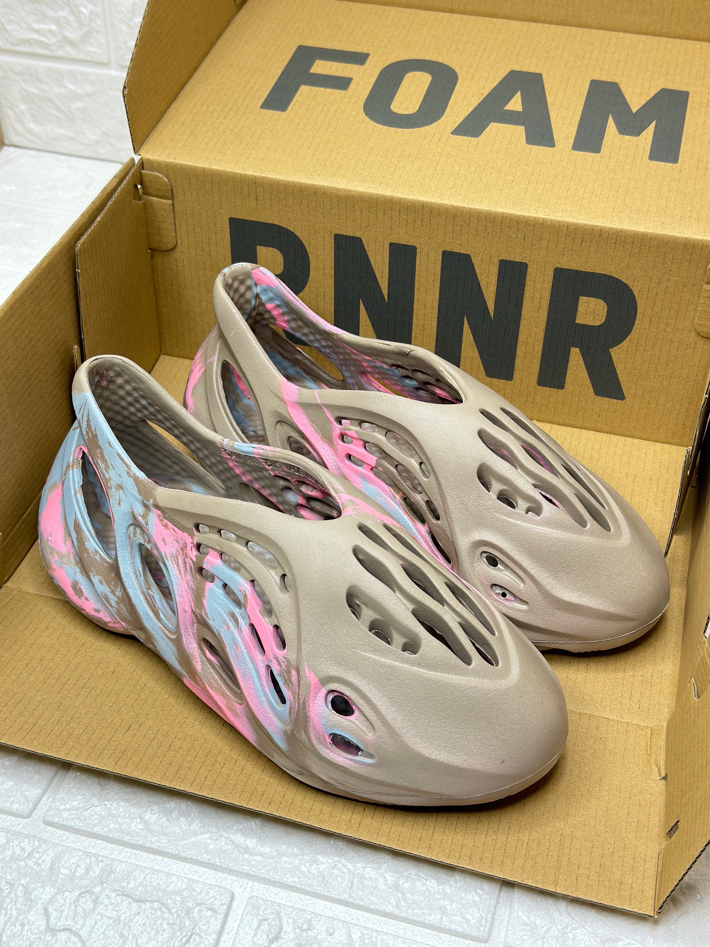 Adidas Yeezy Foam Runner in the "MX Sand Grey" colorway, featuring a blend of EVA and algae-based foam for a lightweight, durable, and comfortable slip-on shoe. image 1