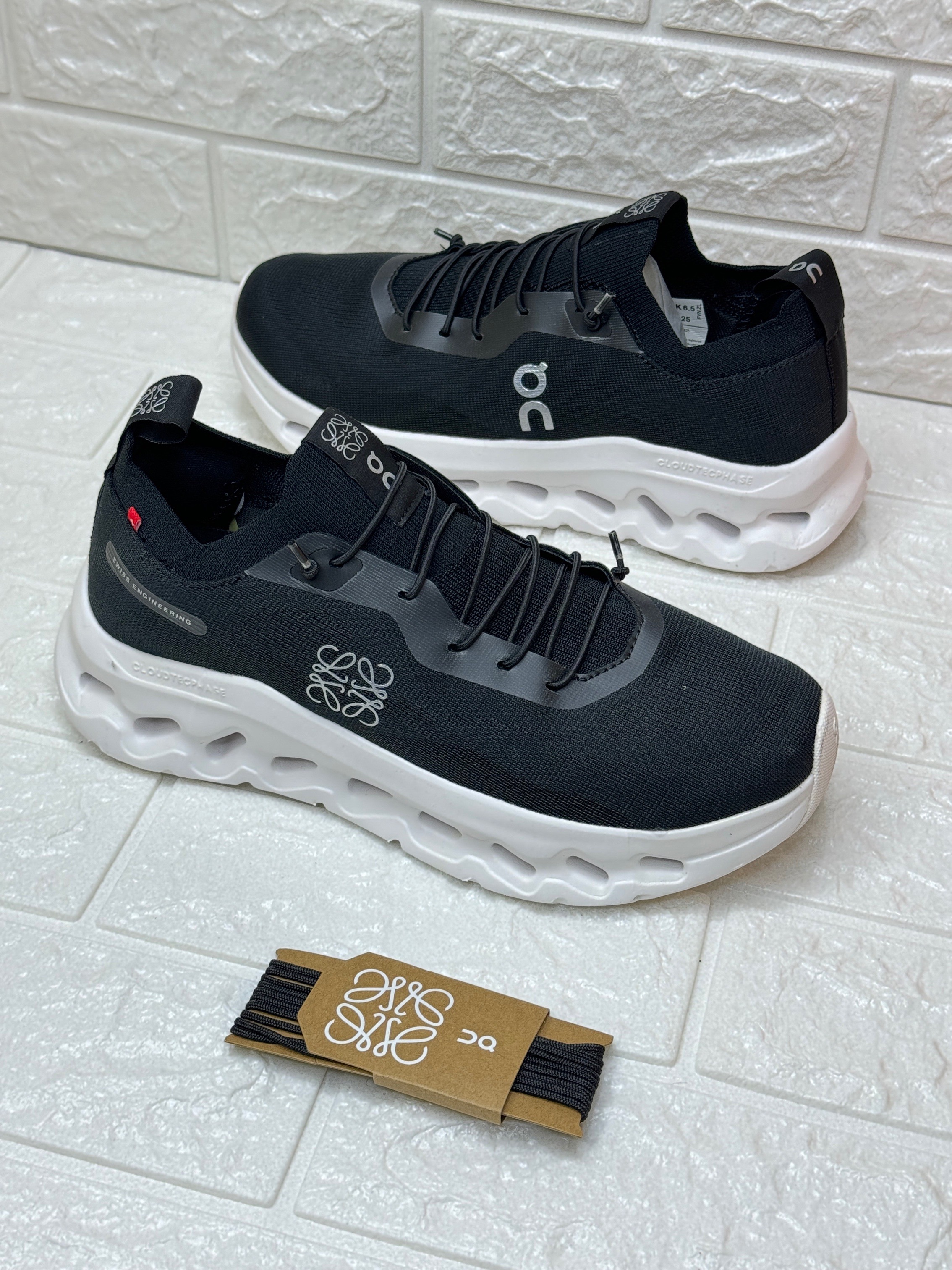 LOEWE x On Cloudtilt 2.0 running shoes in the 'All Black' colorway. image 1