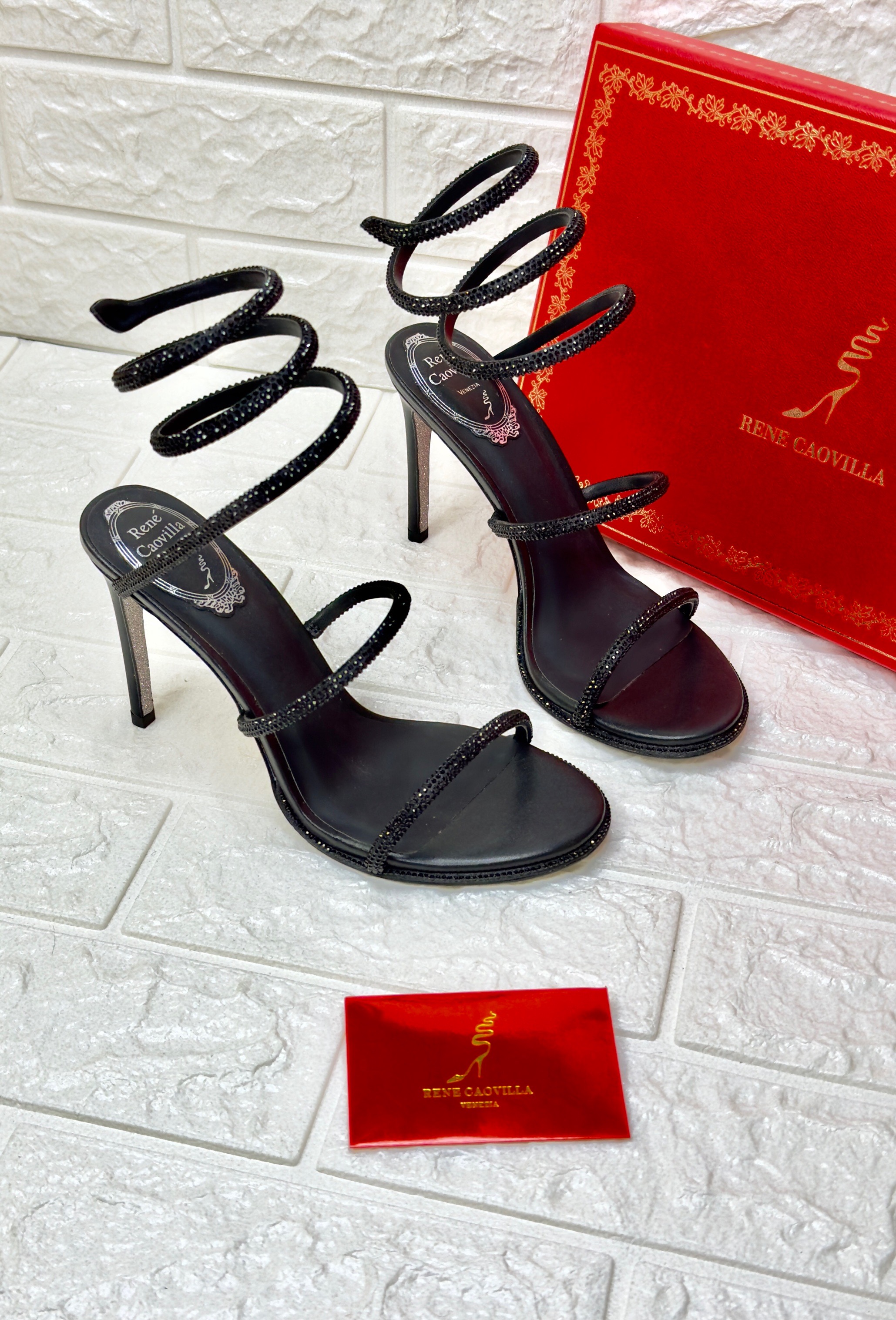 Ren? Caovilla Cleo crystal-embellished sandals in black satin or leather. image 1