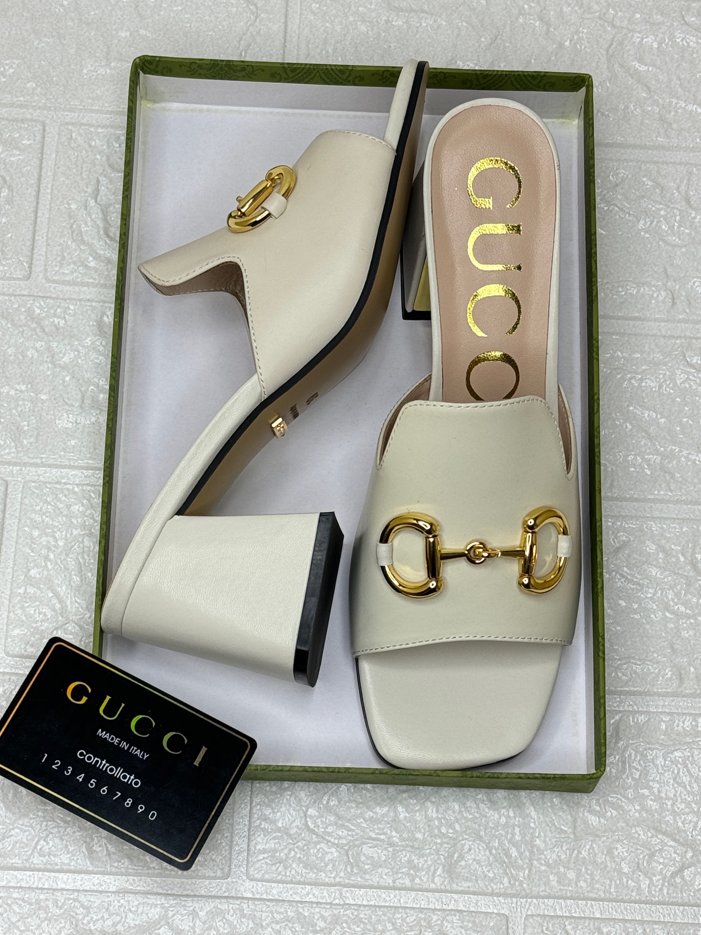 Gucci Horsebit slide sandal in white leather with gold-tone hardware. image 1