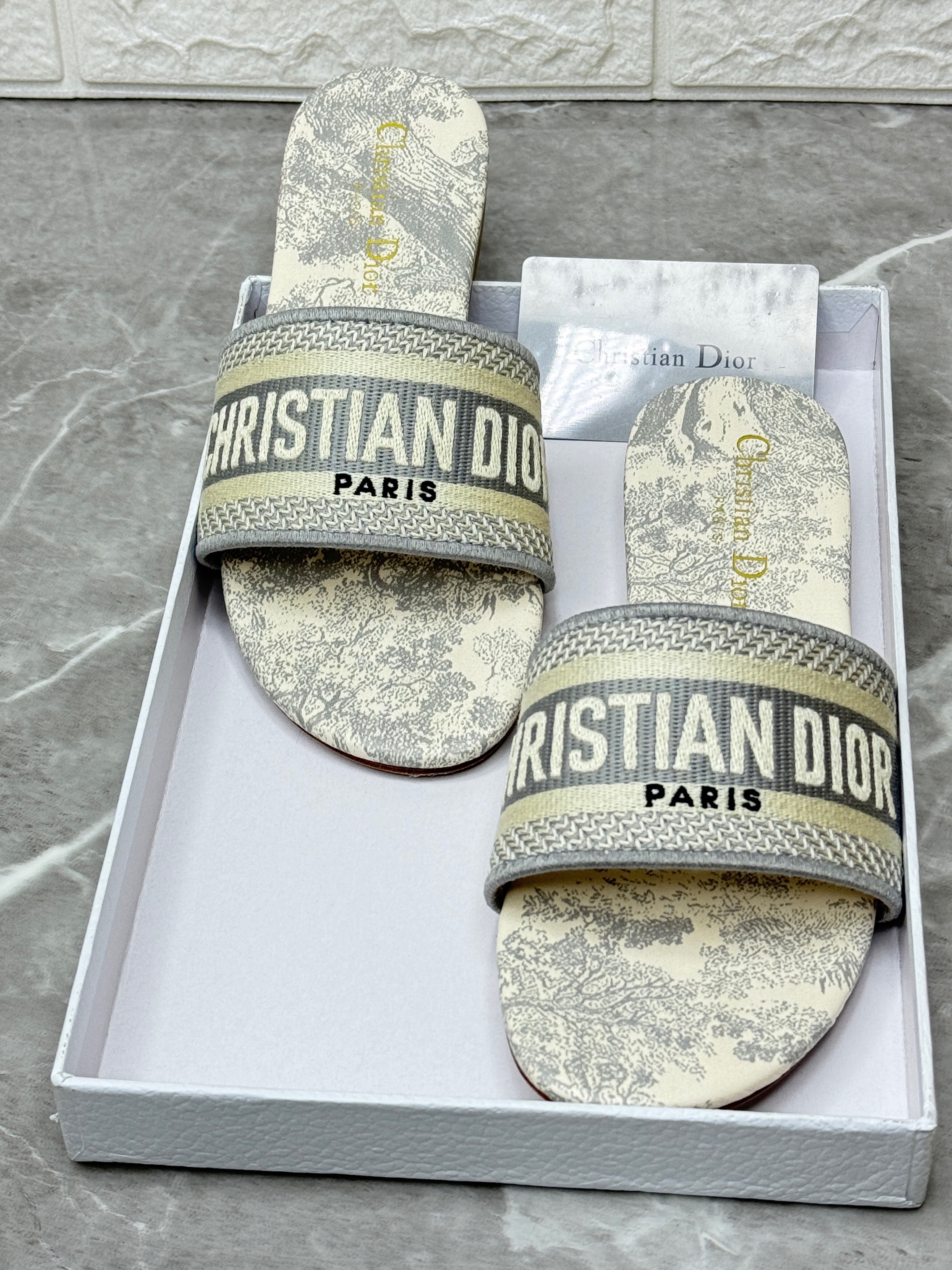 Christian Dior Dway slides with a Toile de Jouy motif and an embroidered "Christian Dior Paris" signature strap. image 1