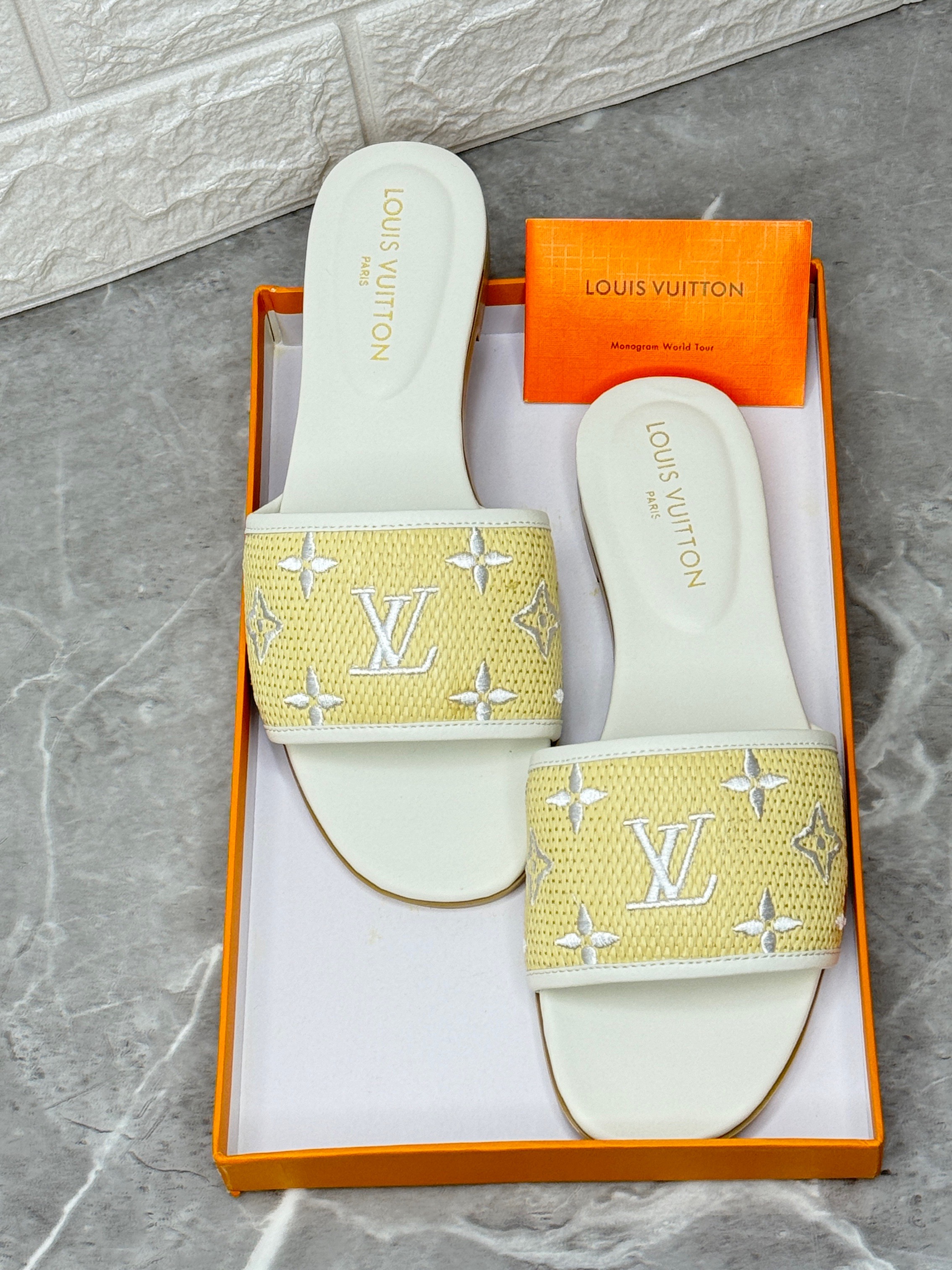 Louis Vuitton Revival Flat Sandals in the green/white colorway. image 1