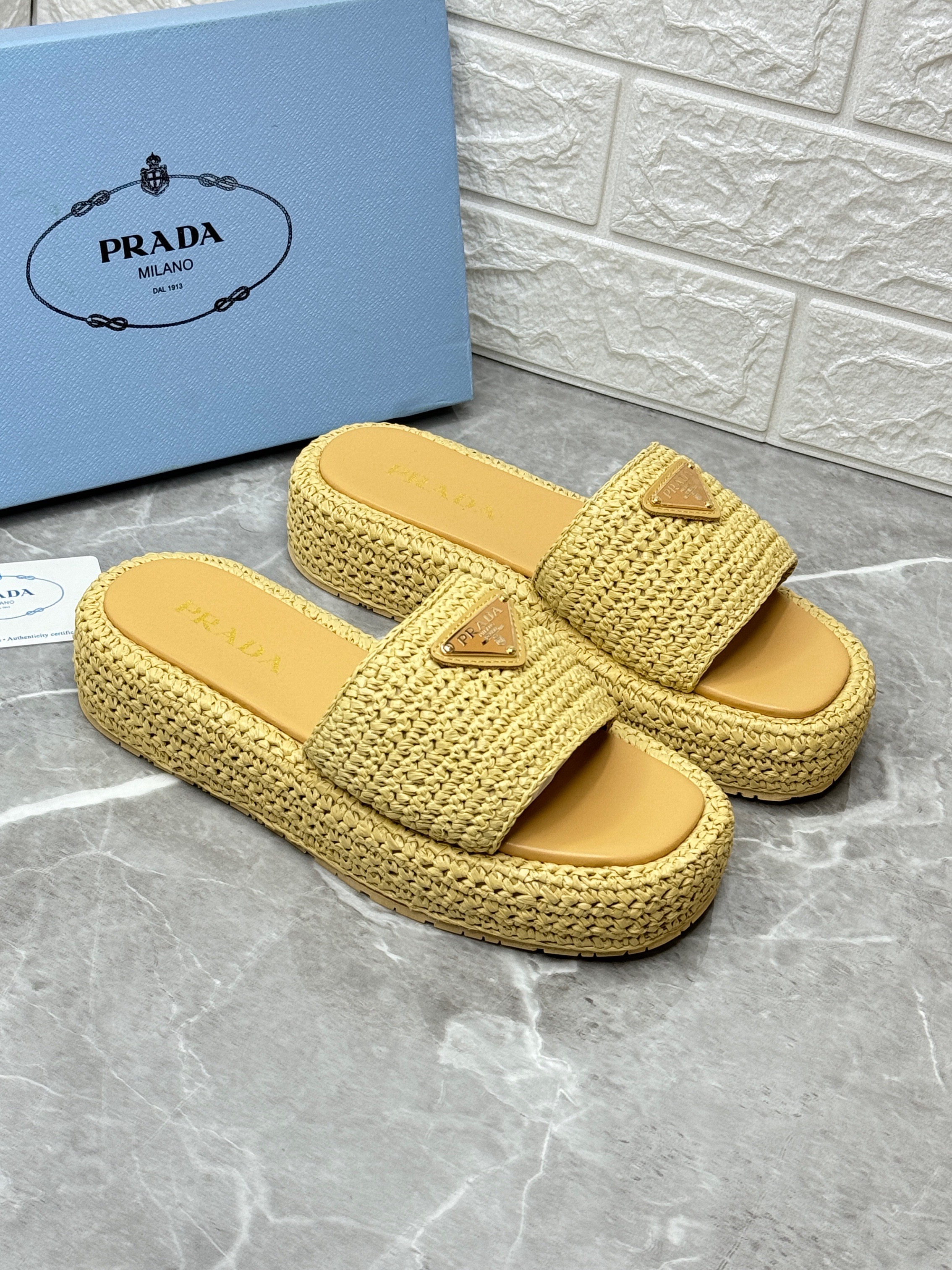 Prada Crochet Flatform Slides in a natural raffia-effect yarn. image 1
