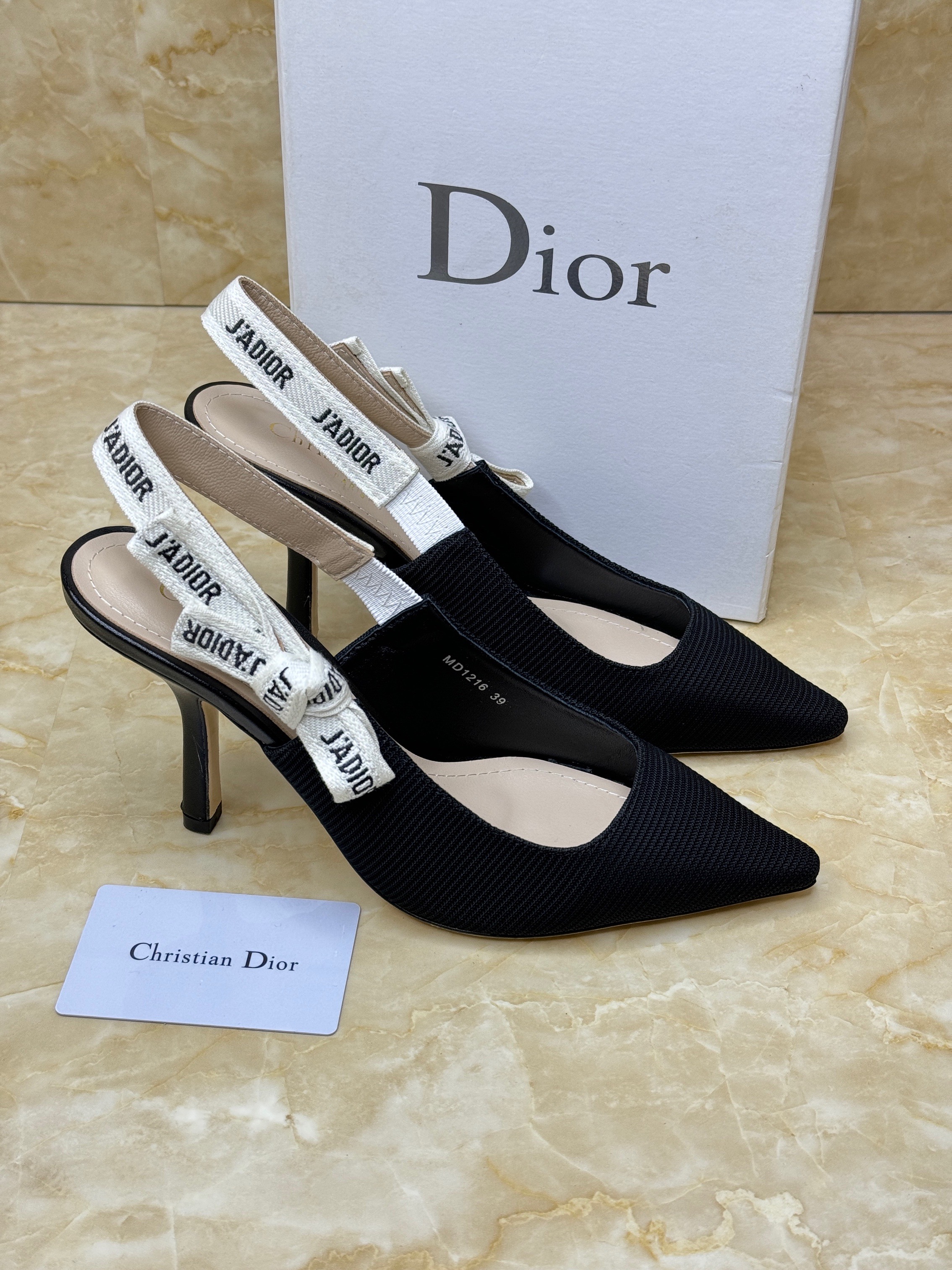 Dior J'Adior slingback pump in black technical fabric with a comma heel. image 1