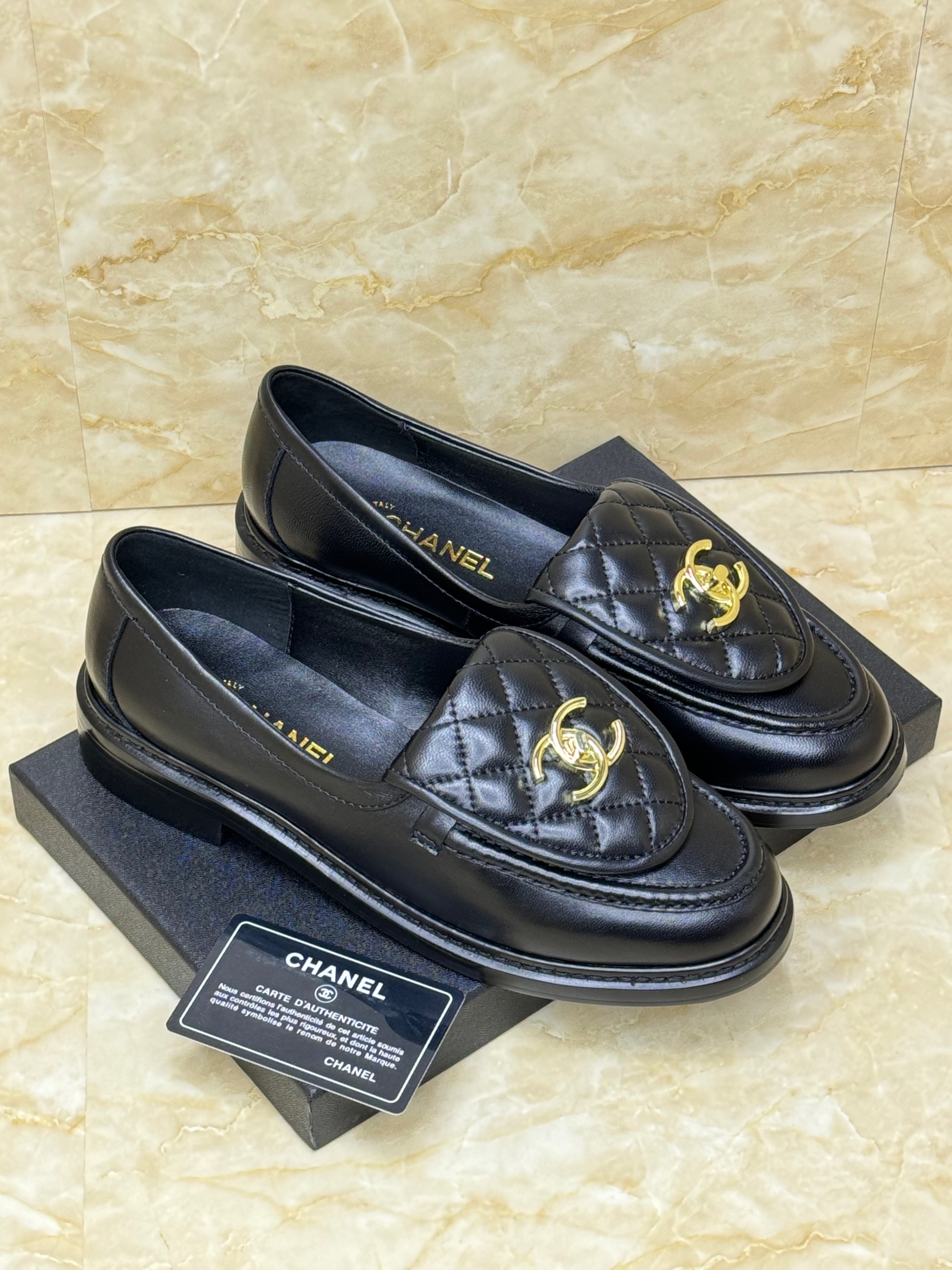 Chanel black quilted leather CC turnlock loafers image 1