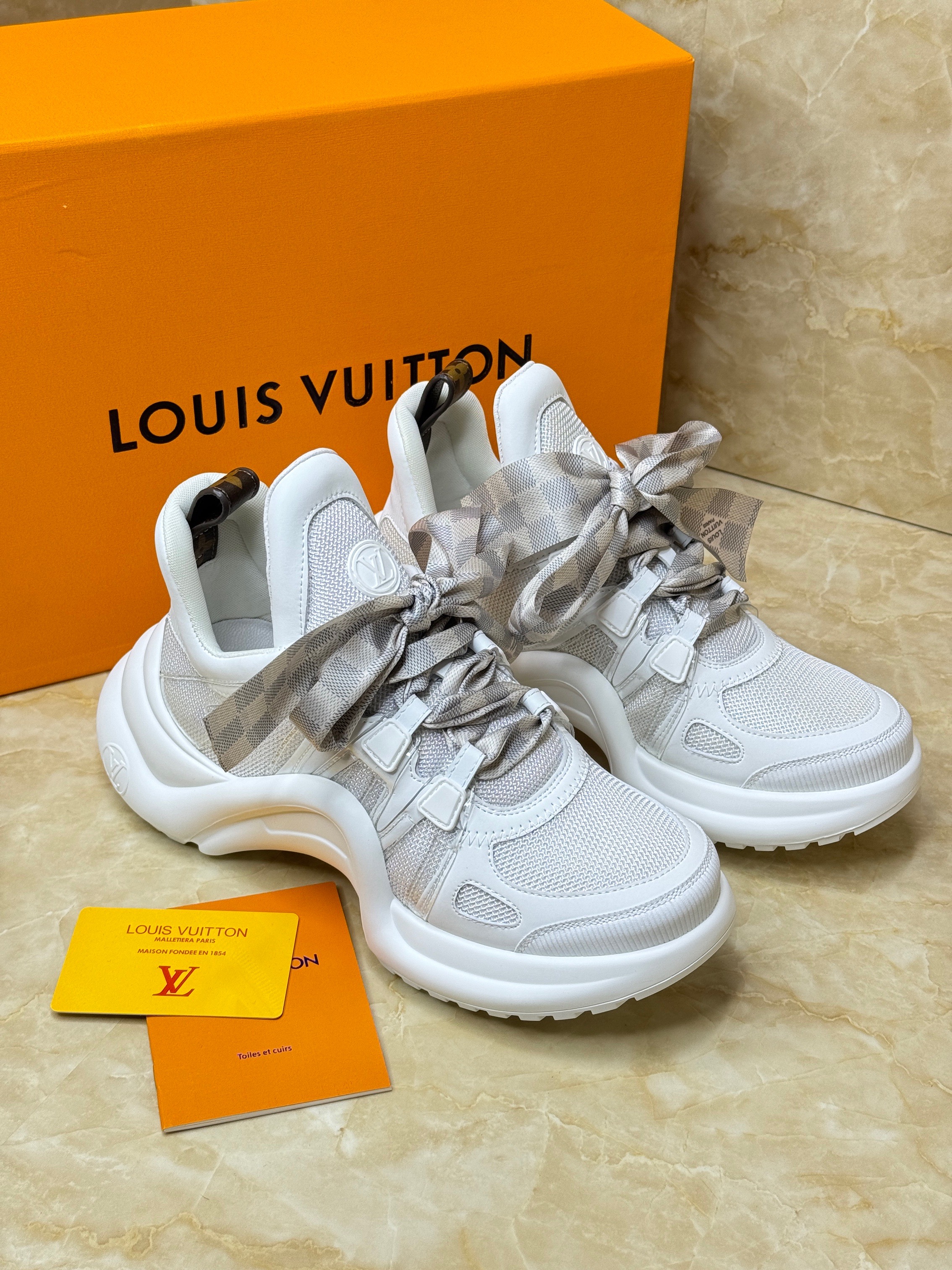 Louis Vuitton LV Archlight sneakers in perforated calf leather with an oversized rubber outsole. image 1