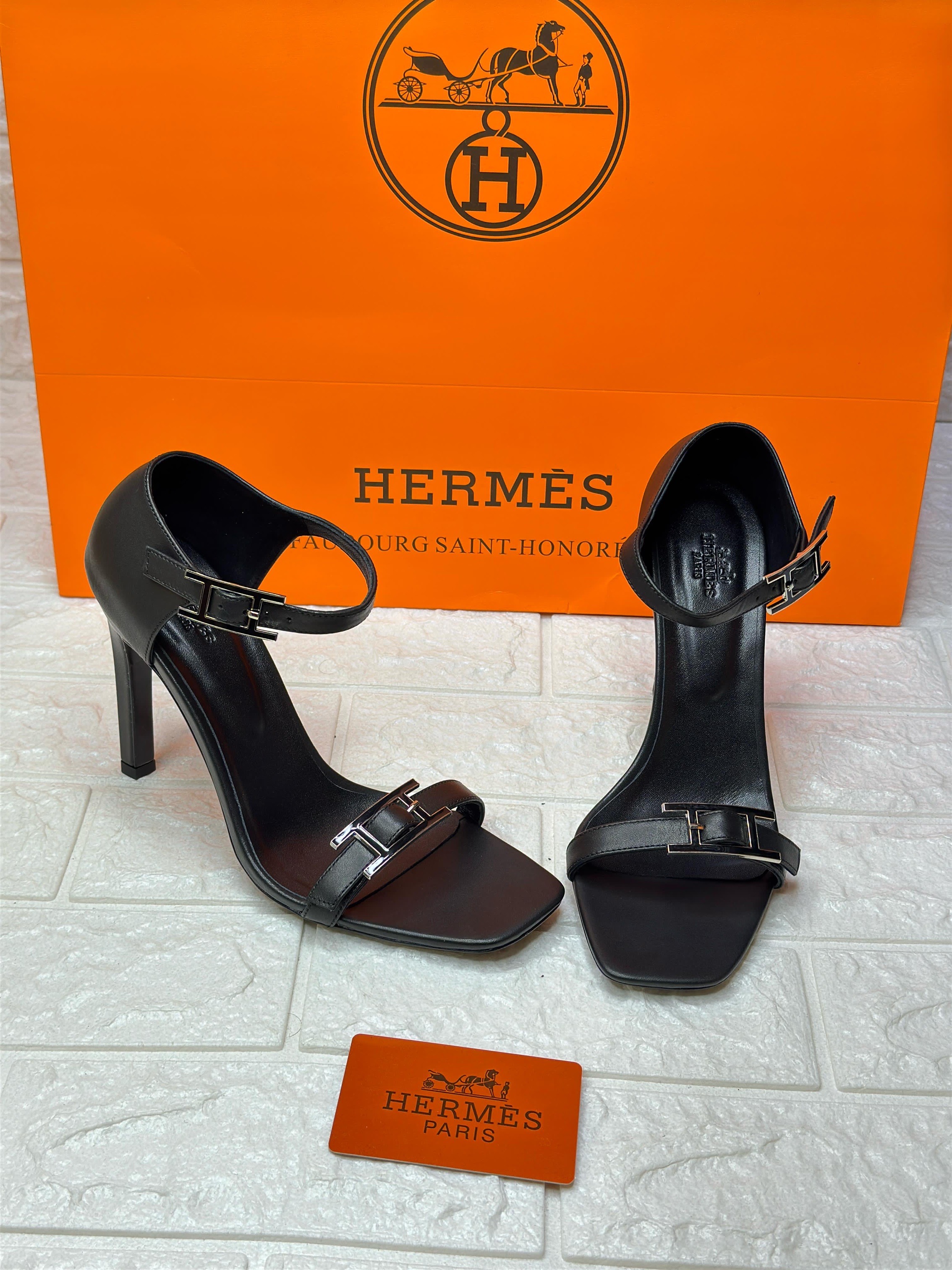 Herm?s Judy 70 or 105 sandals in black velvet or goatskin leather with a rose gold-plated or palladium-plated Hapi buckle. image 1