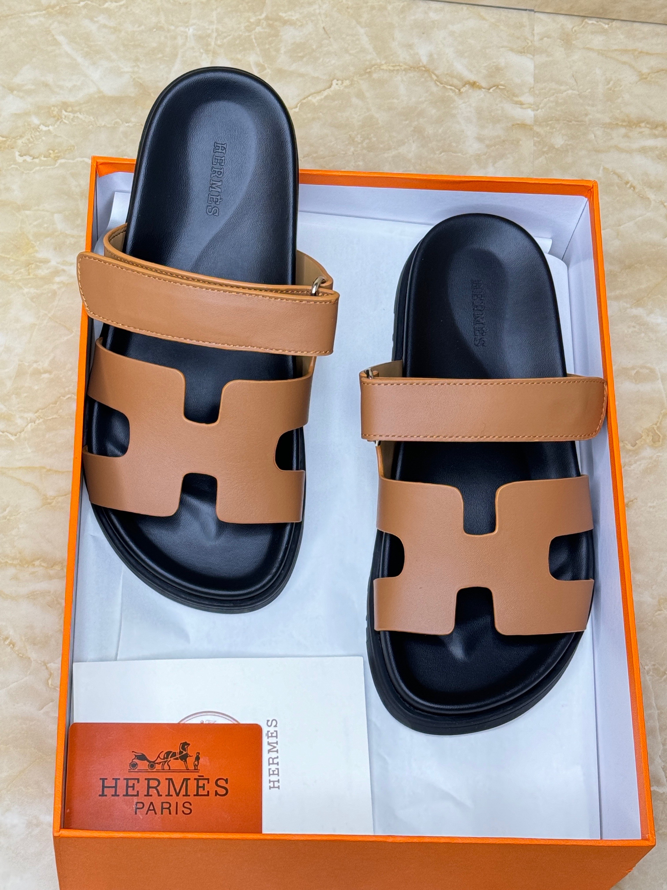 Herm?s Chypre sandals in gold calfskin leather. image 1