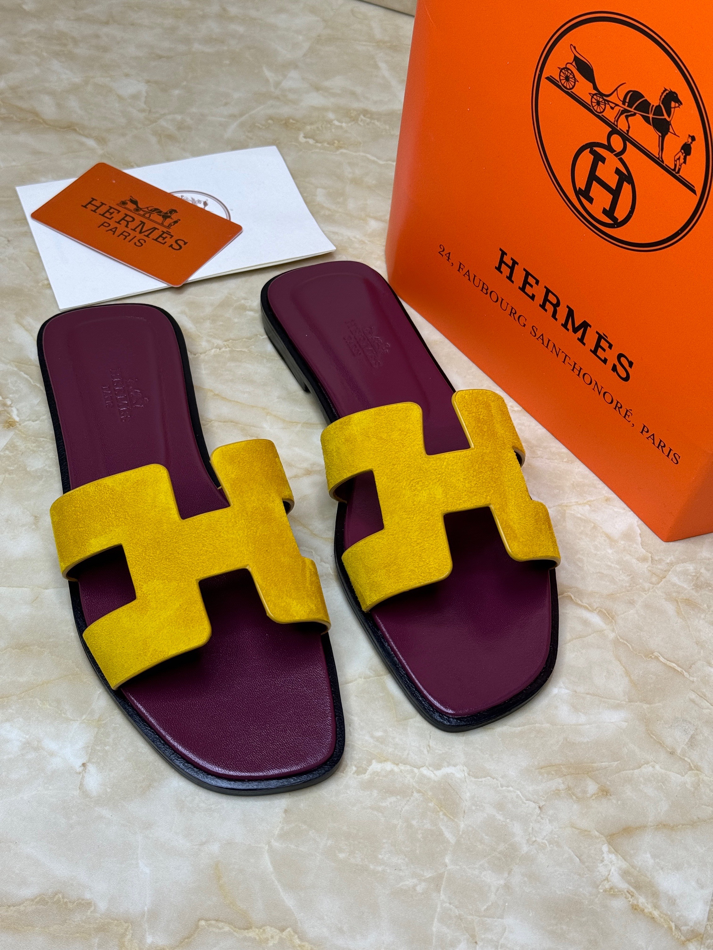 Herm?s Suede Goatskin Oran Sandals in Jaune Topaze with dark purple insoles. image 1