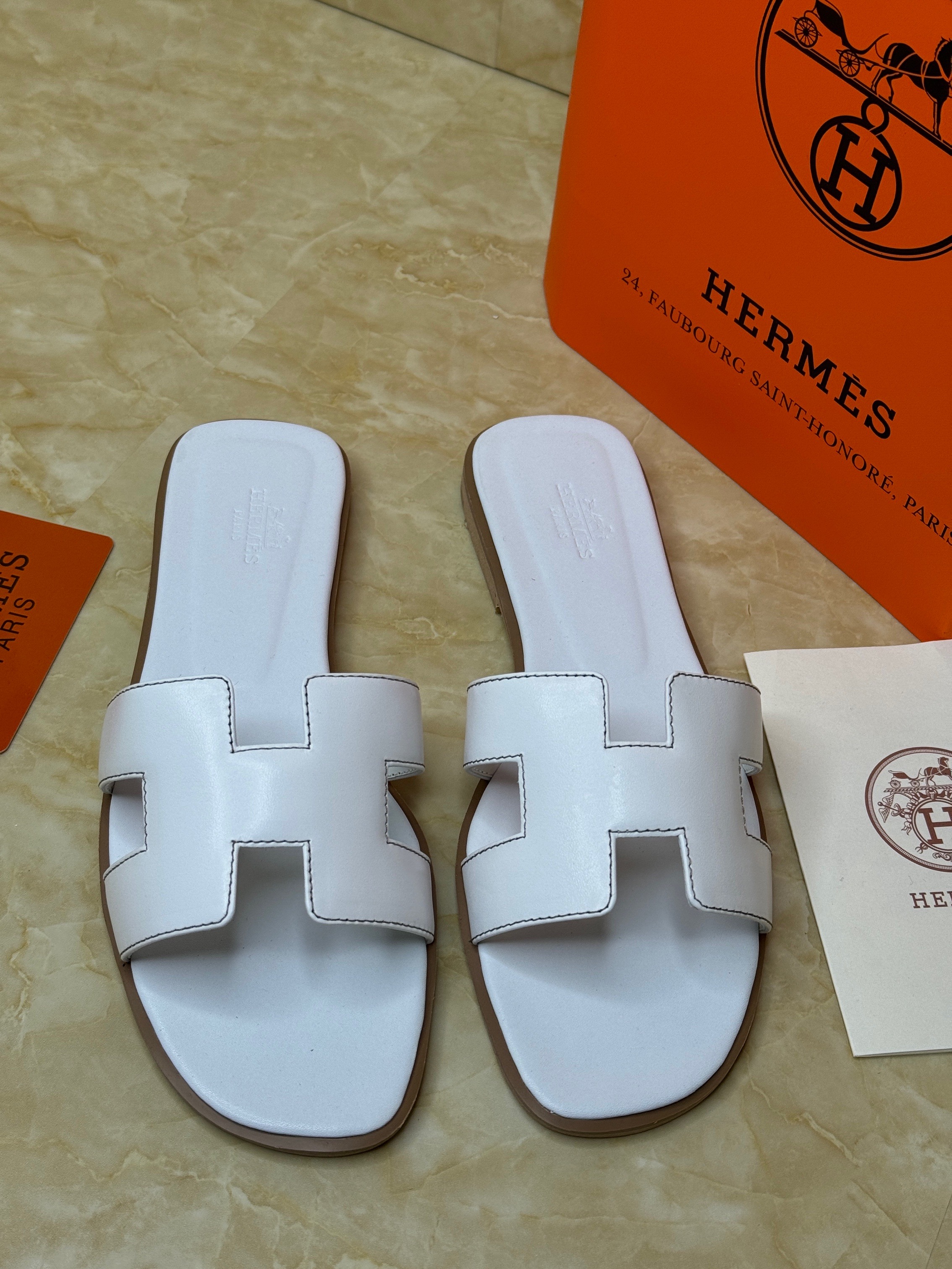 Herm?s Oran sandals in white calfskin leather. image 1