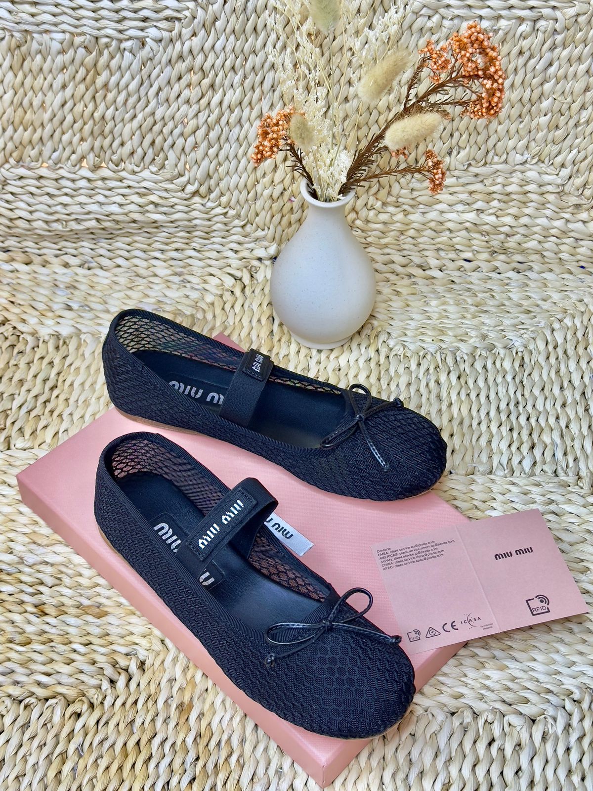 Miu Miu mesh fabric ballerinas in black with a logo-decorated elastic strap and a delicate bow detail. image 1