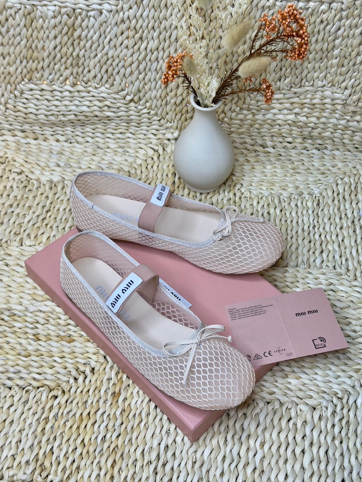 Miu Miu mesh fabric ballerinas in pink with an elastic logo strap and a bow detail. image 1