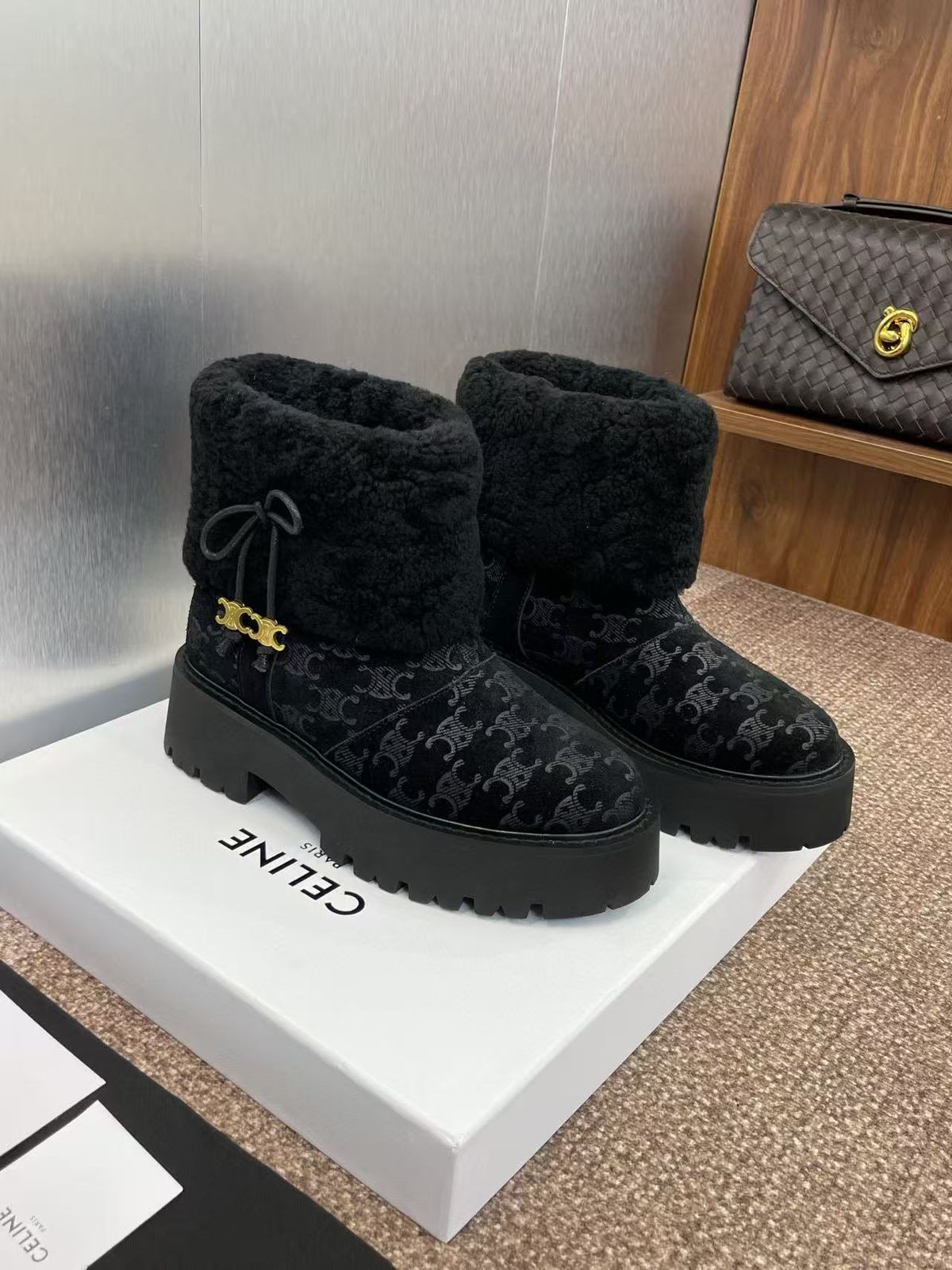 Celine Shearling Winter Boots with a Triomphe monogram pattern. image 1